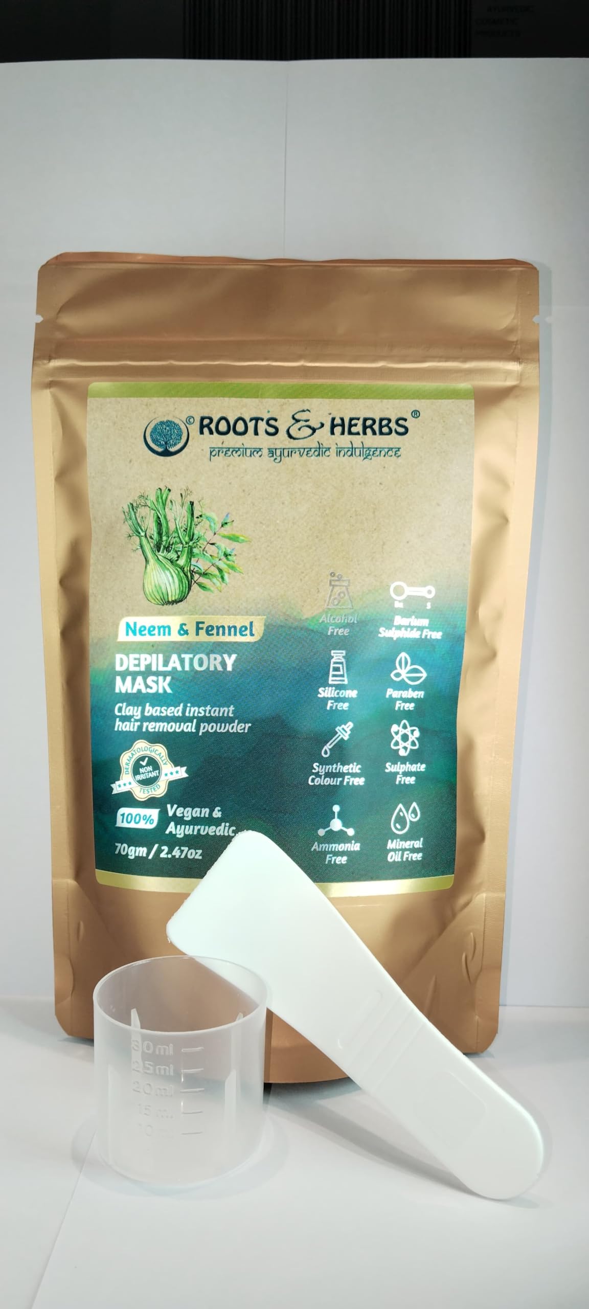 Roots and Herbs neem-fennel powder texture closeup shows herbal depilatory