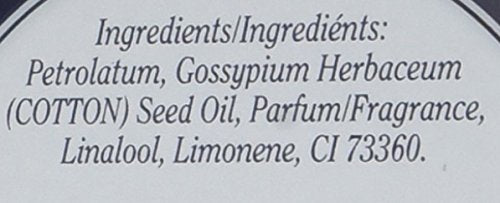 Rosebud Perfume Lip Salve Rosebud 2-pack creamy balm on finger for quick lip care.