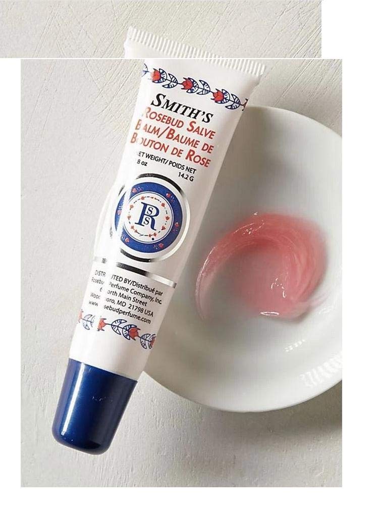 Rosebud Salve lip application close-up for soothing moisture
