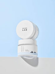 ROUND LAB 1025 Dokdo Cream bottle application demonstrates ceramide-rich barrier support.