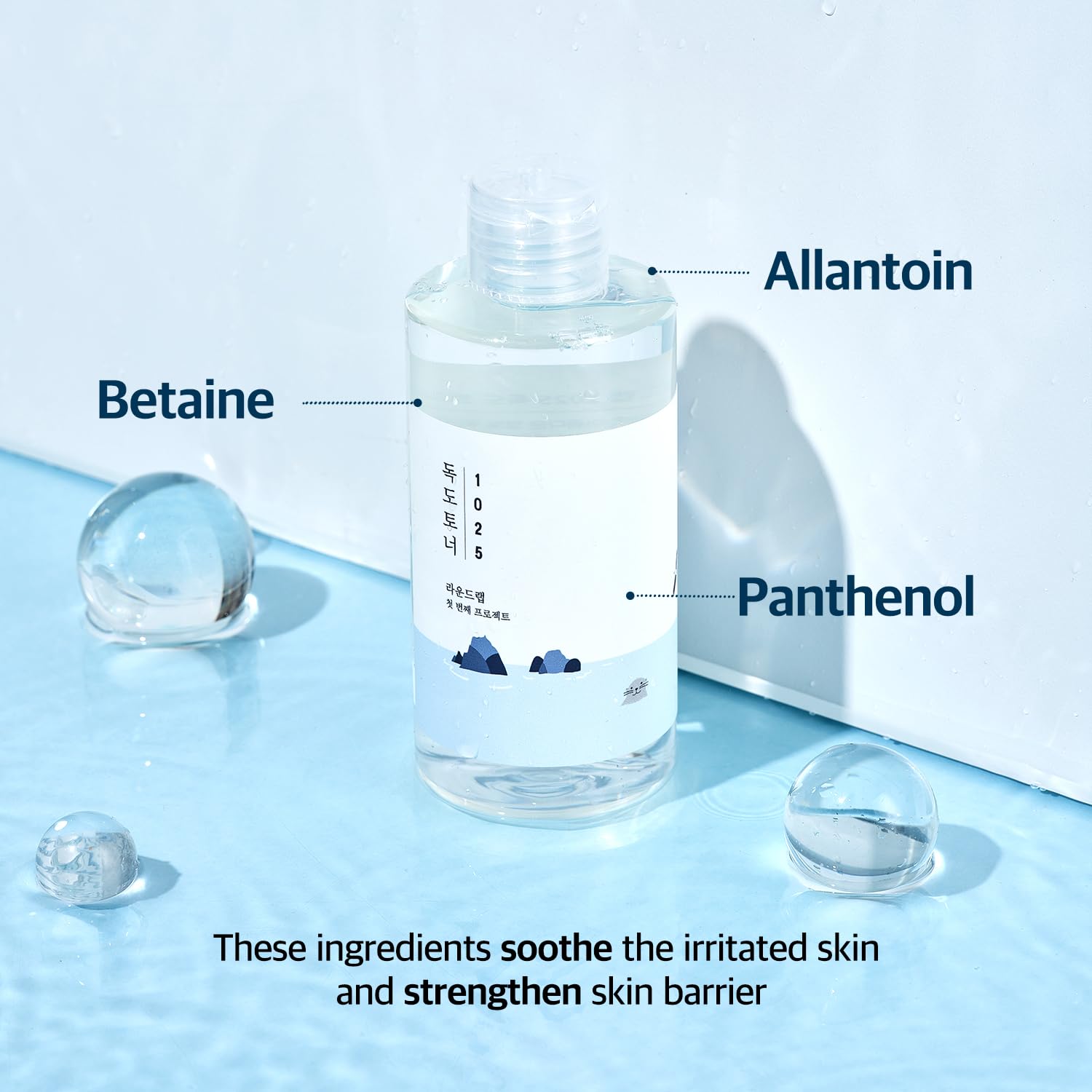 ROUND LAB Dokdo toner bottle with droplet emphasizes hydrating, breathable skin feel.