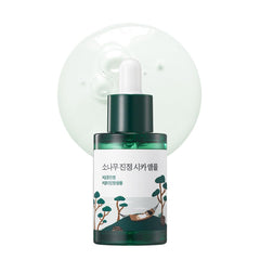 ROUND LAB Pine Calming Cica Ampoule bottle delivering soothing hydration for sensitive skin barrier support.