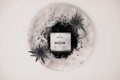 Rowe Casa Organics raw shea butter formula creamy lotion close-up showing nourishing formula.