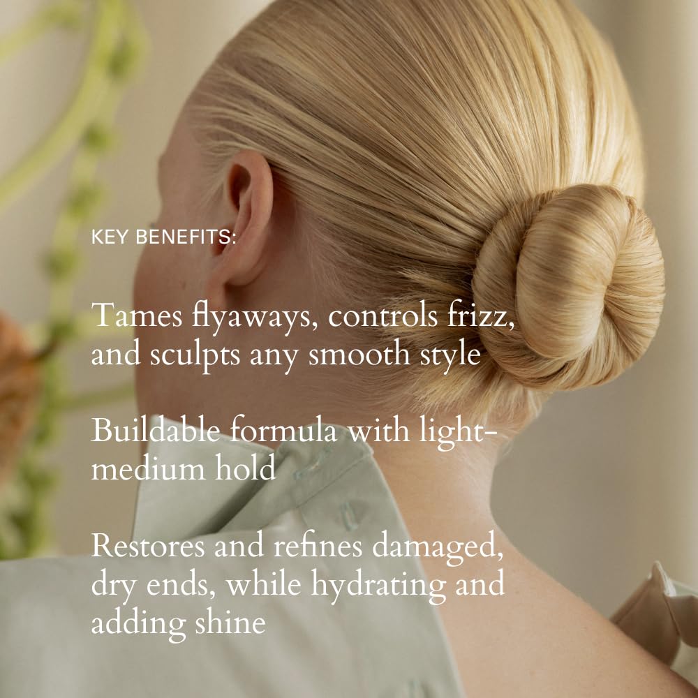 RŌZ Evergreen styling cream smoothing flyaways with light to medium hold.