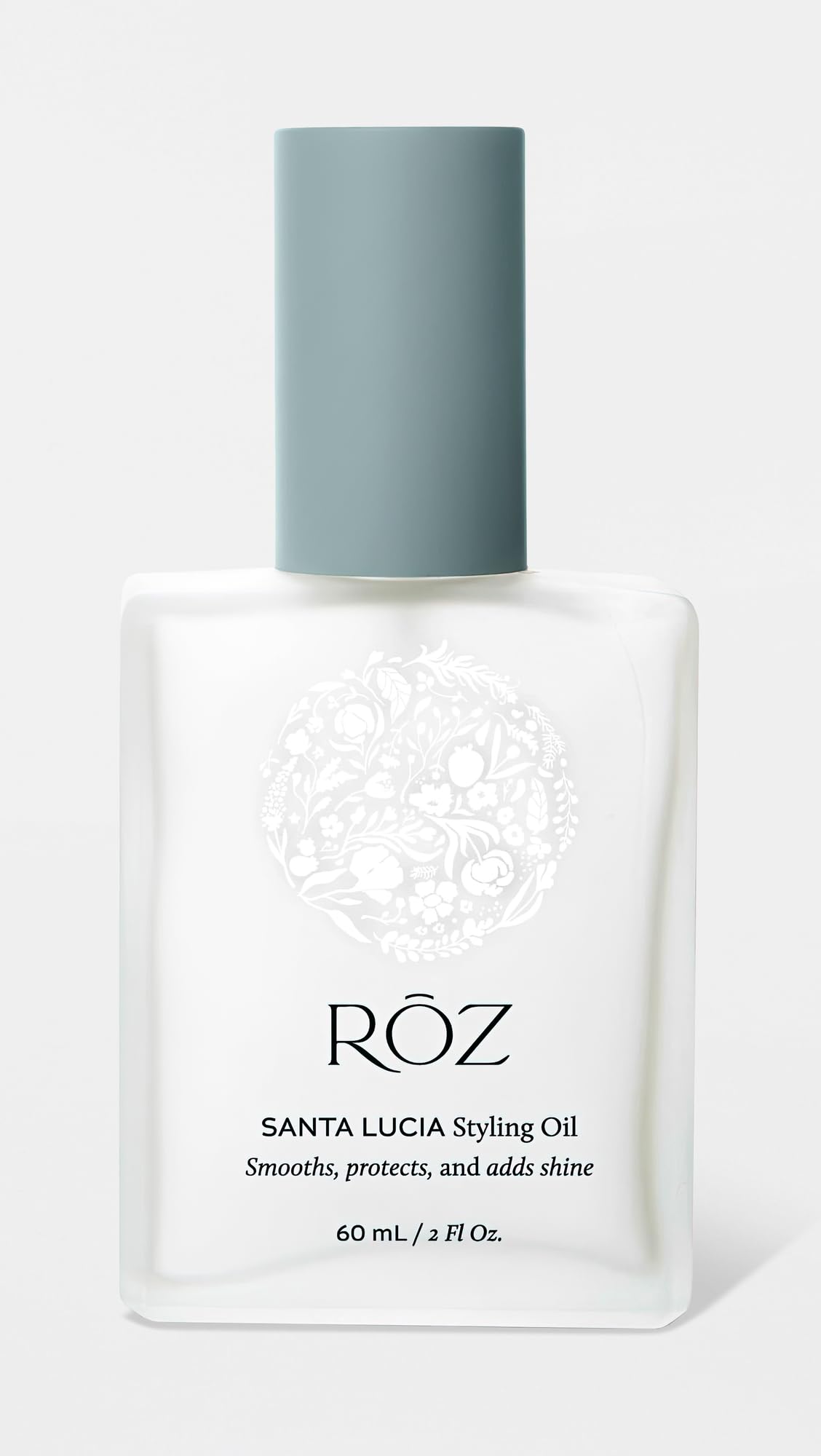 ROZ Santa Lucia Styling Oil on frizzy hair for smooth finish.