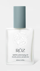 ROZ Santa Lucia Styling Oil on frizzy hair for smooth finish.