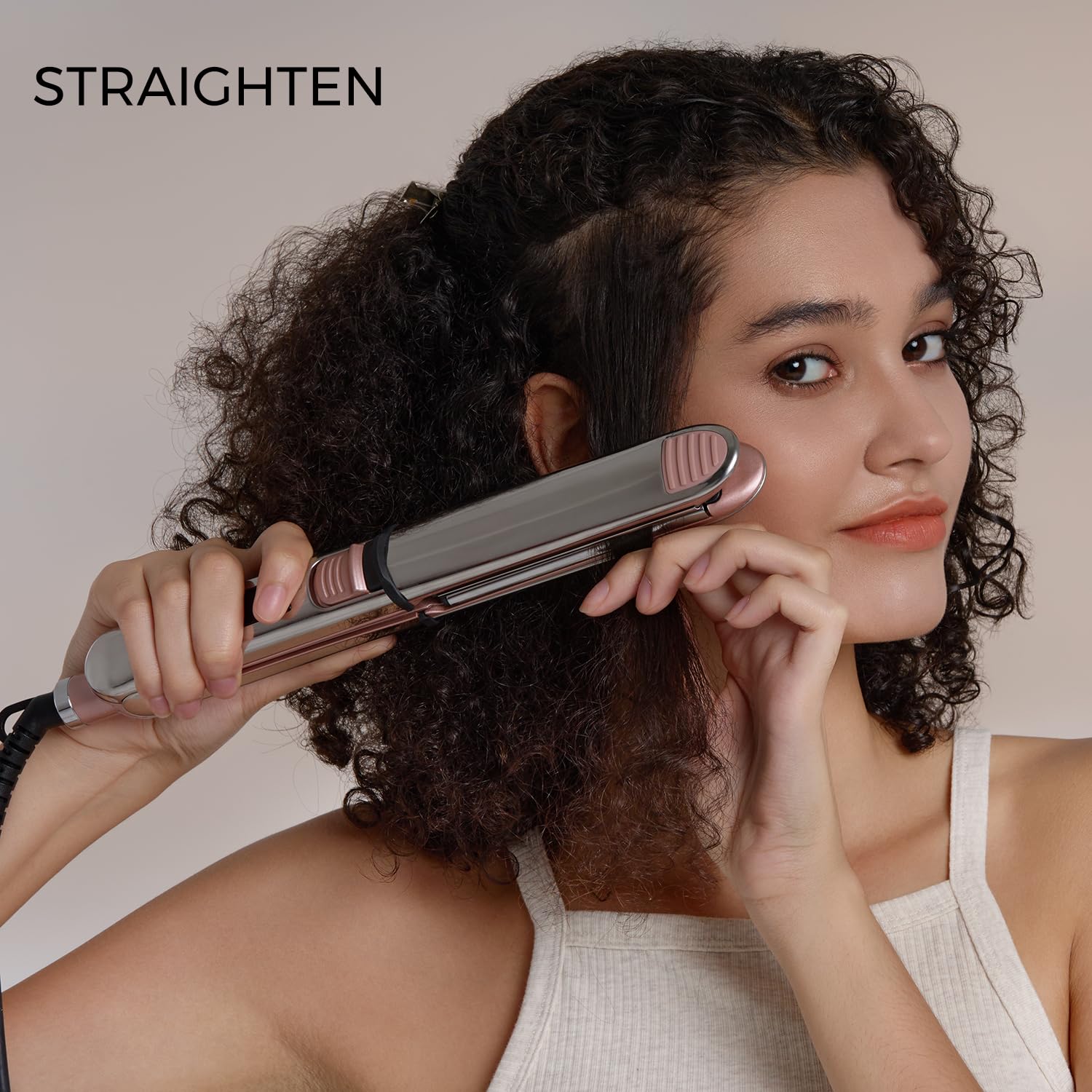 Rozamor in-use styling shot shows quick curl and straight versatility.
