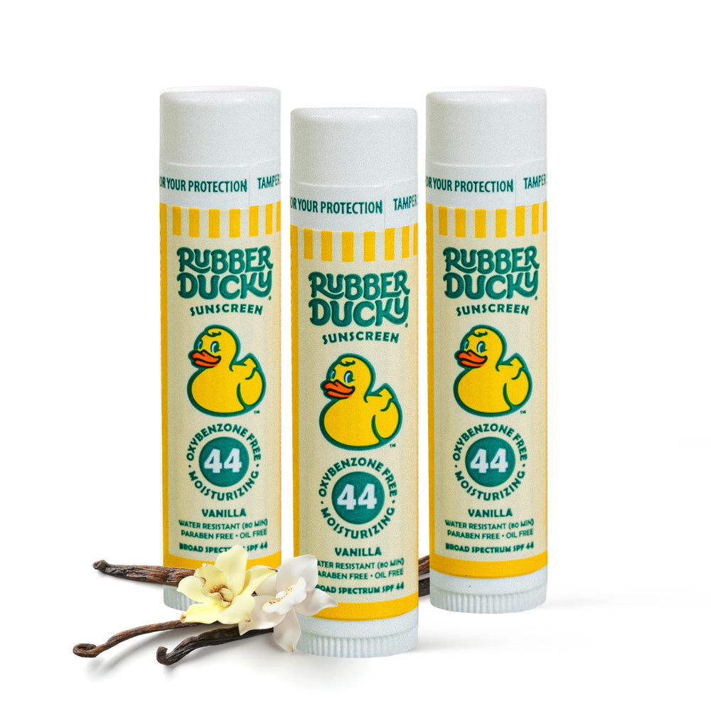 Rubber Ducky lip sunscreen SPF 44 applied to lips for outdoor protection during play