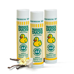 Rubber Ducky lip sunscreen SPF 44 applied to lips for outdoor protection during play
