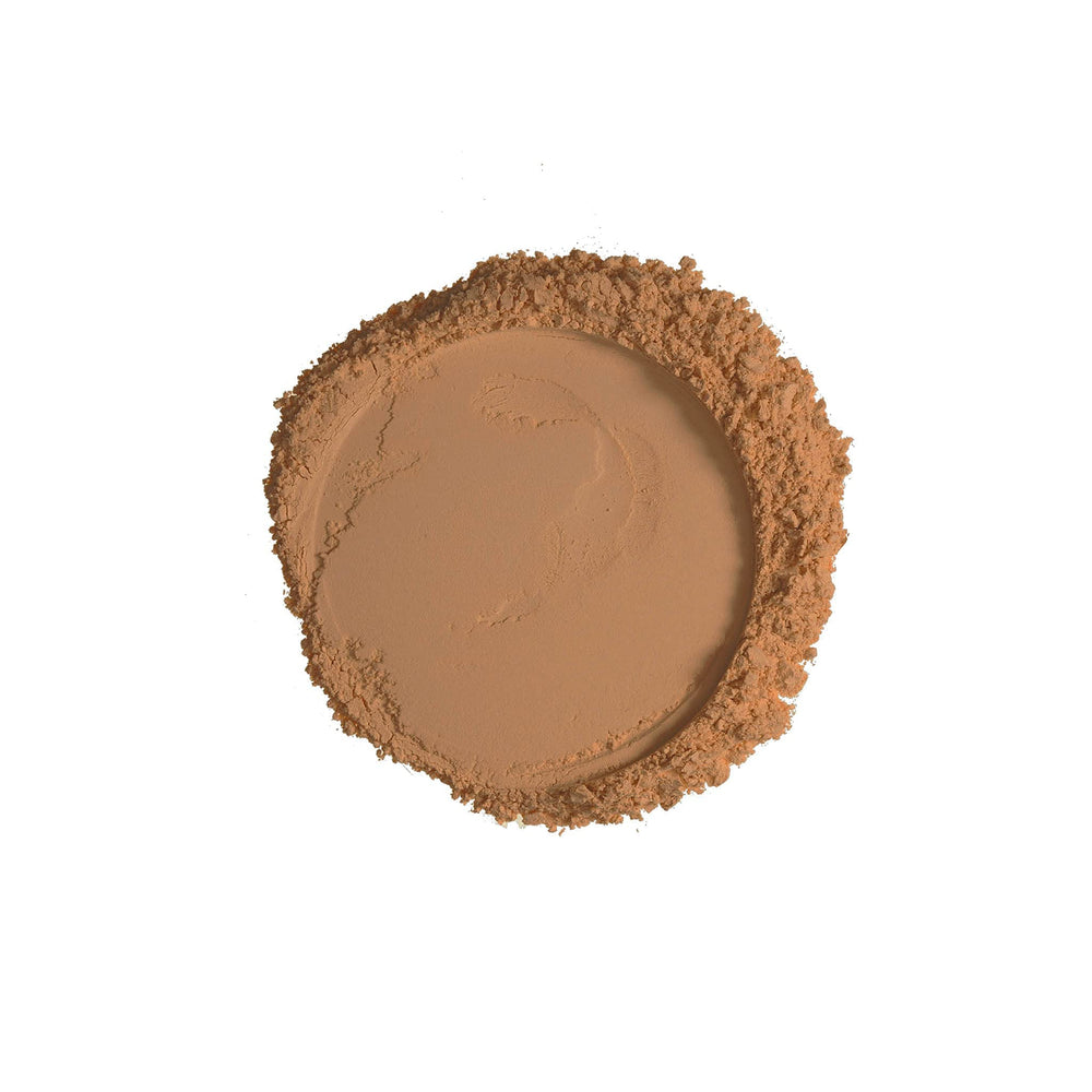 Ruby Kisses No More Blemish Powder application brush demonstrates easy, even powder application
