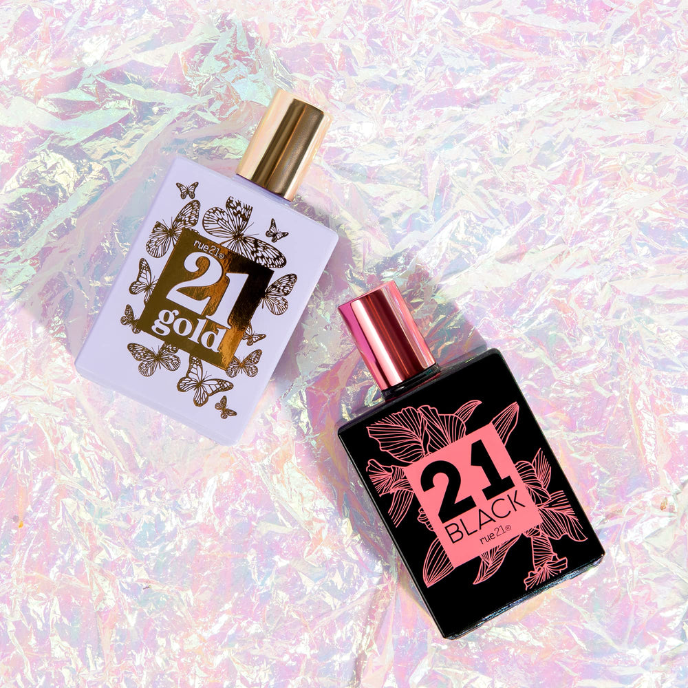 Rue 21 Gold cap closeup highlighting premium packaging and allure.