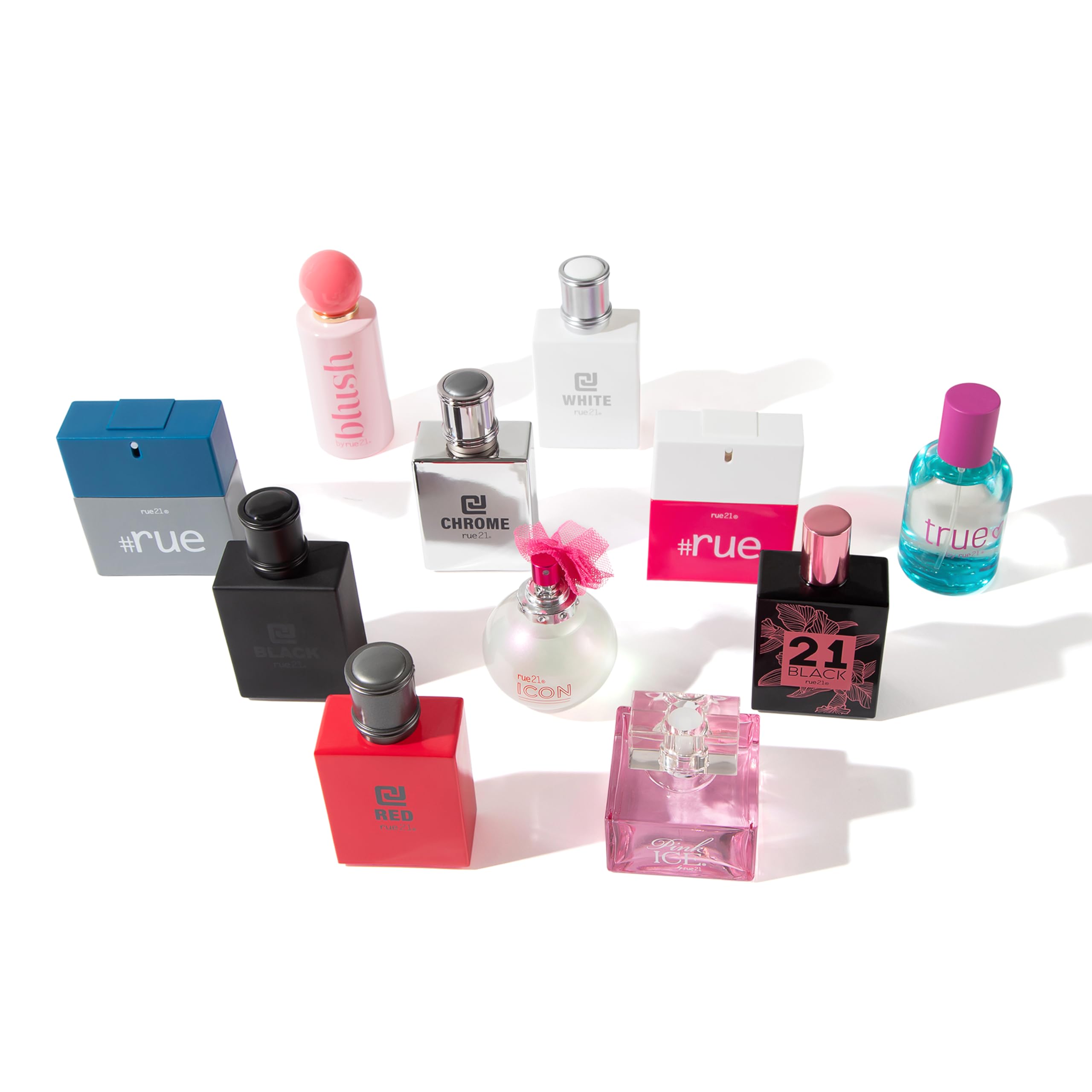 Rue 21 Pink Ice flatlay—fragrance with apple and vanilla hints for day-to-night routine.