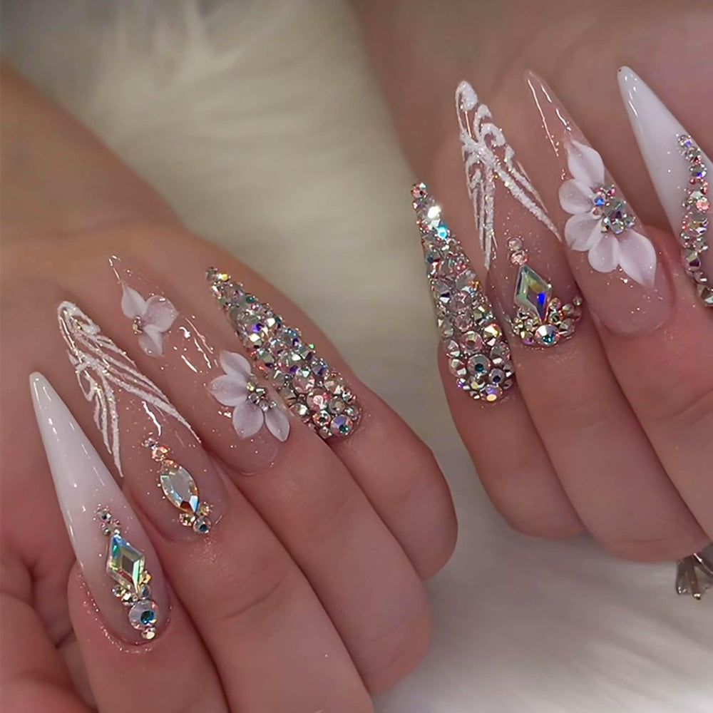 RUOKEXIN long press nails in stiletto glitter finish for a bold at-home manicure.