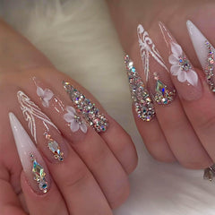 RUOKEXIN long press nails in stiletto glitter finish for a bold at-home manicure.