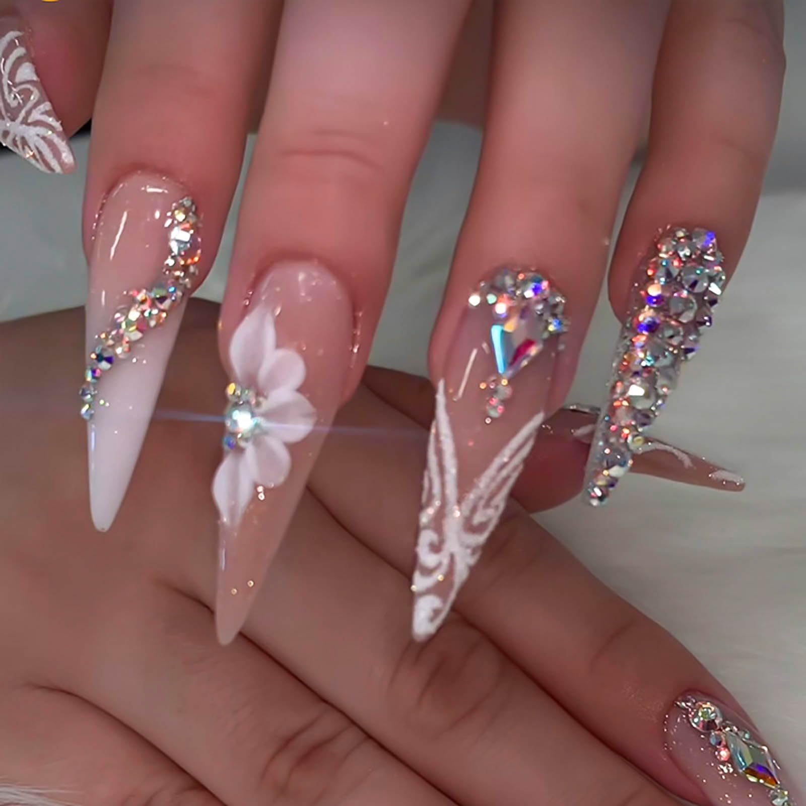 RUOKEXIN rhinestones designs nails show sparkling accents for party-ready style.