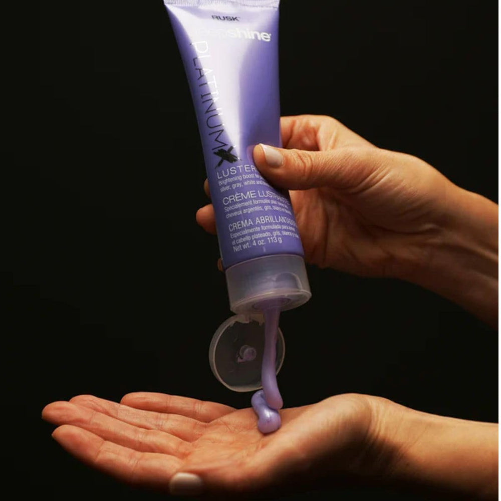 RUSK PlatinumX Lusterizer applied to hands for easy distribution.