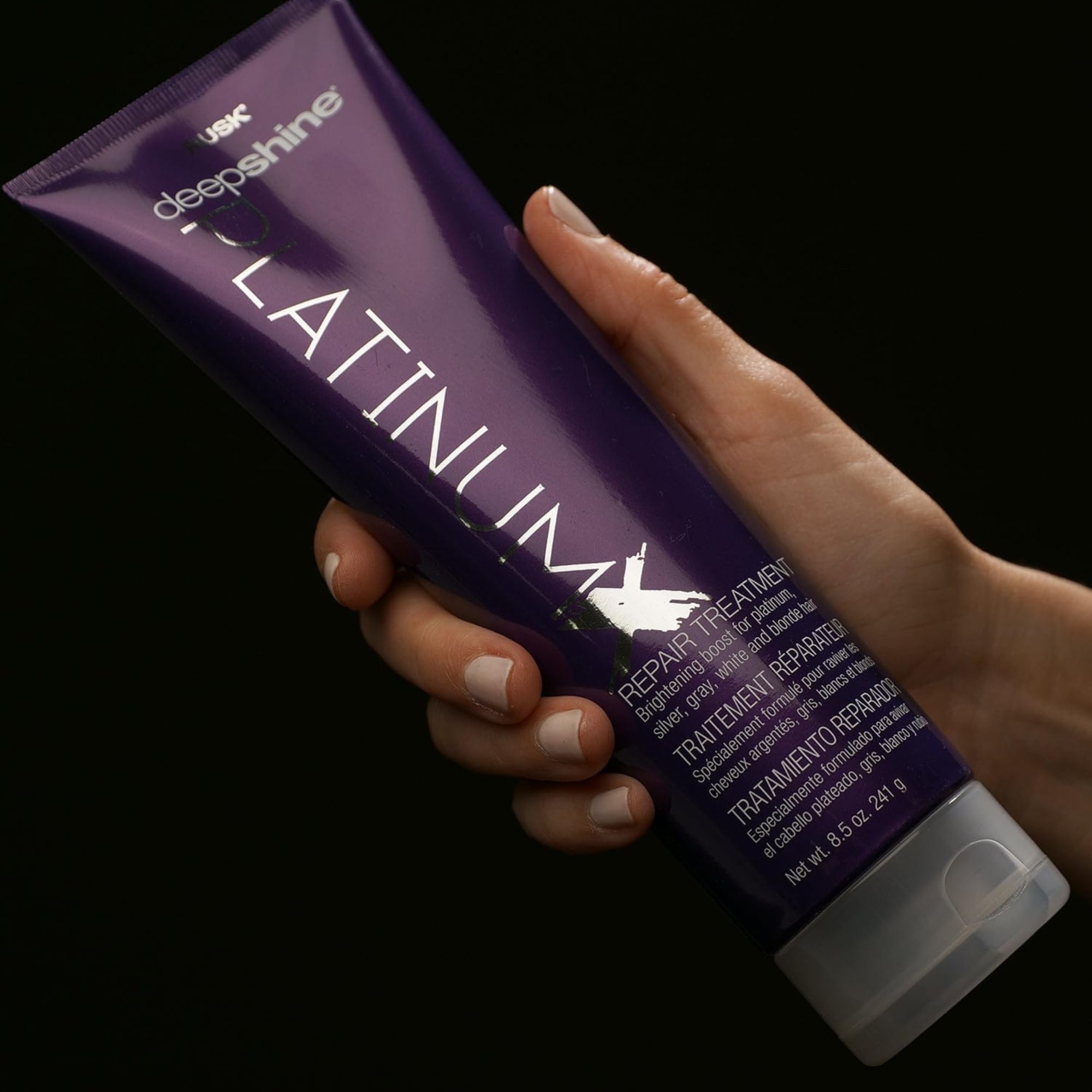 Close-up of Violet 2 in PlatinumX neutralizing brassiness for cooler platinum tones.