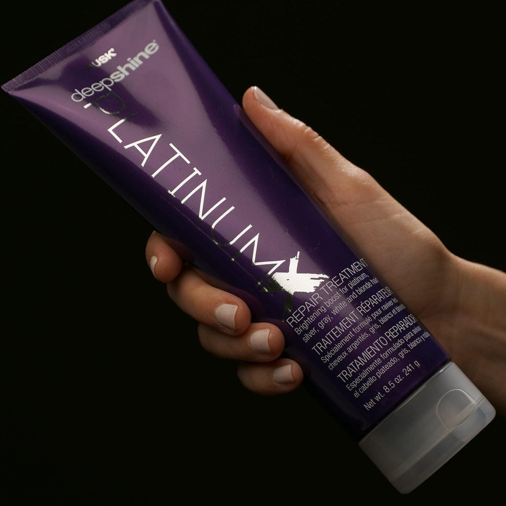 Close-up of Violet 2 in PlatinumX neutralizing brassiness for cooler platinum tones.