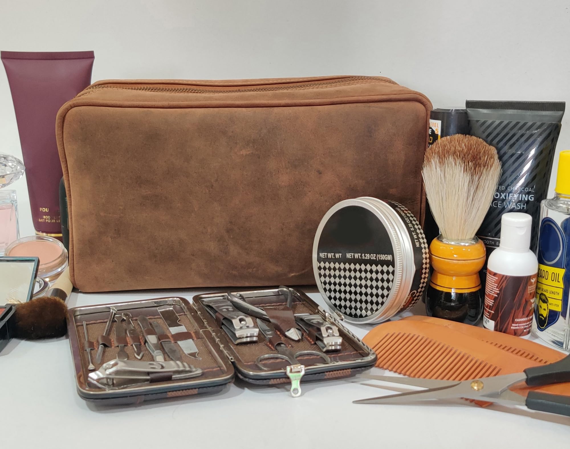 RUSTIC TOWN leather travel bag on hotel counter showcases compact TSA-friendly size
