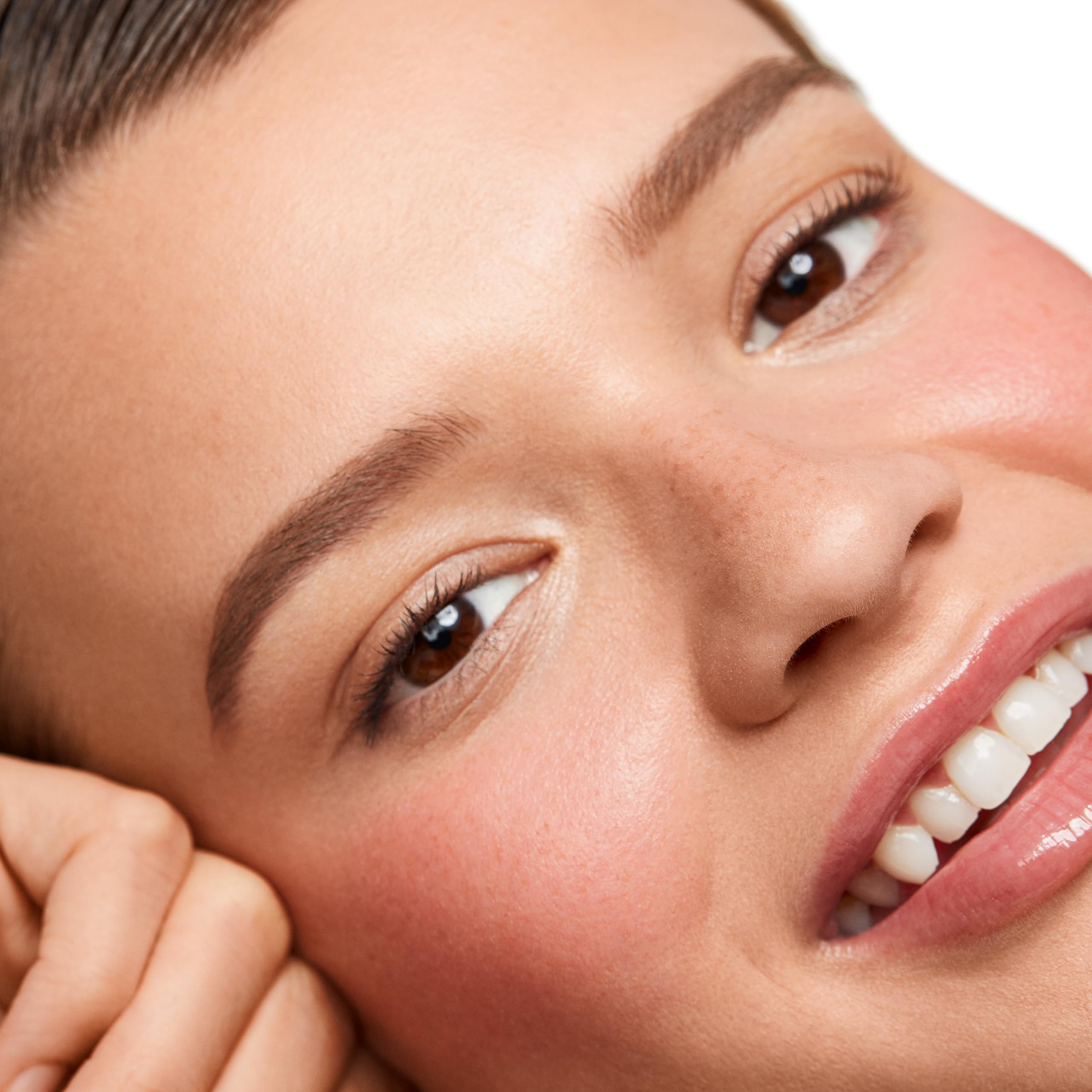 Saie Dew Liquid Blush on cheek shows dewy glow