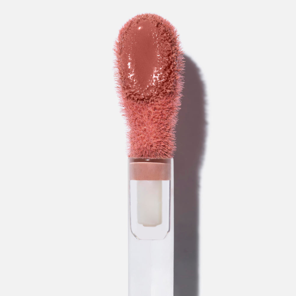 Saie Dew Liquid Blush swatch reveals creamy texture and natural tint.