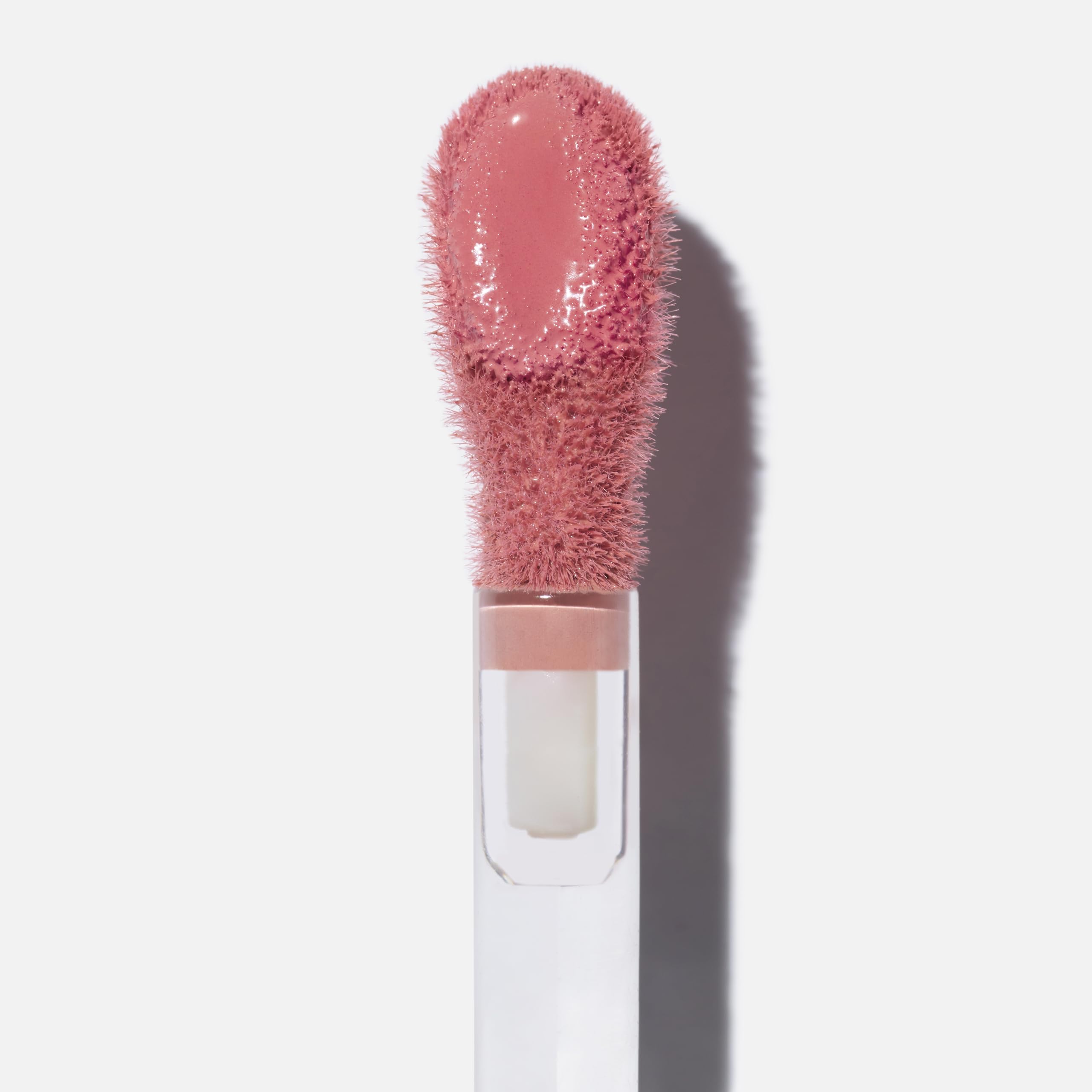 Saie Dew Liquid Blush tube close-up highlighting vegan formula