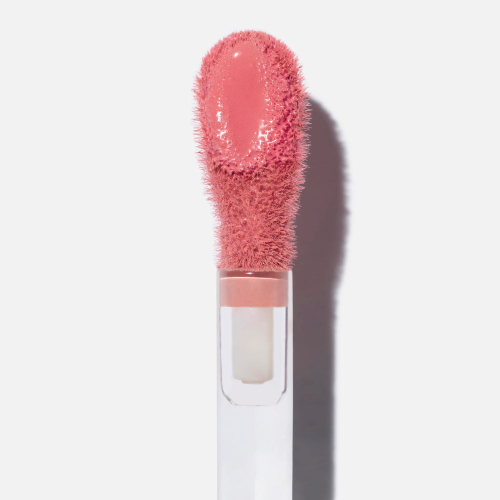 Saie Dew Liquid Blush tube close-up highlighting vegan formula