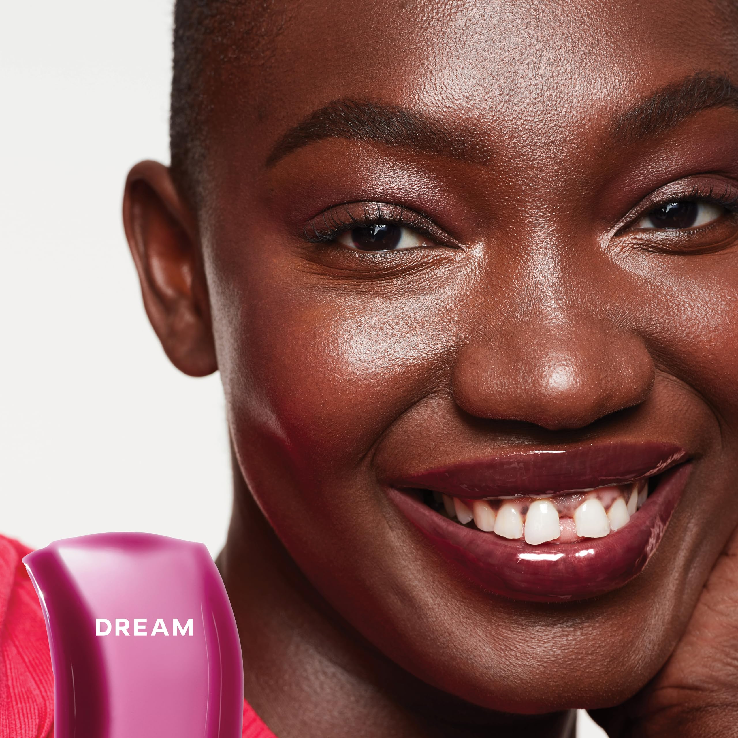 Saie Glossybounce Dream applicator swirls demonstrate easy, precise lip gloss-oil application.