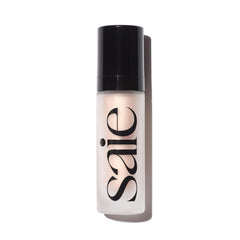 Saie Glowy Super Gel bottle pump shows a dewy primer for radiant skin.