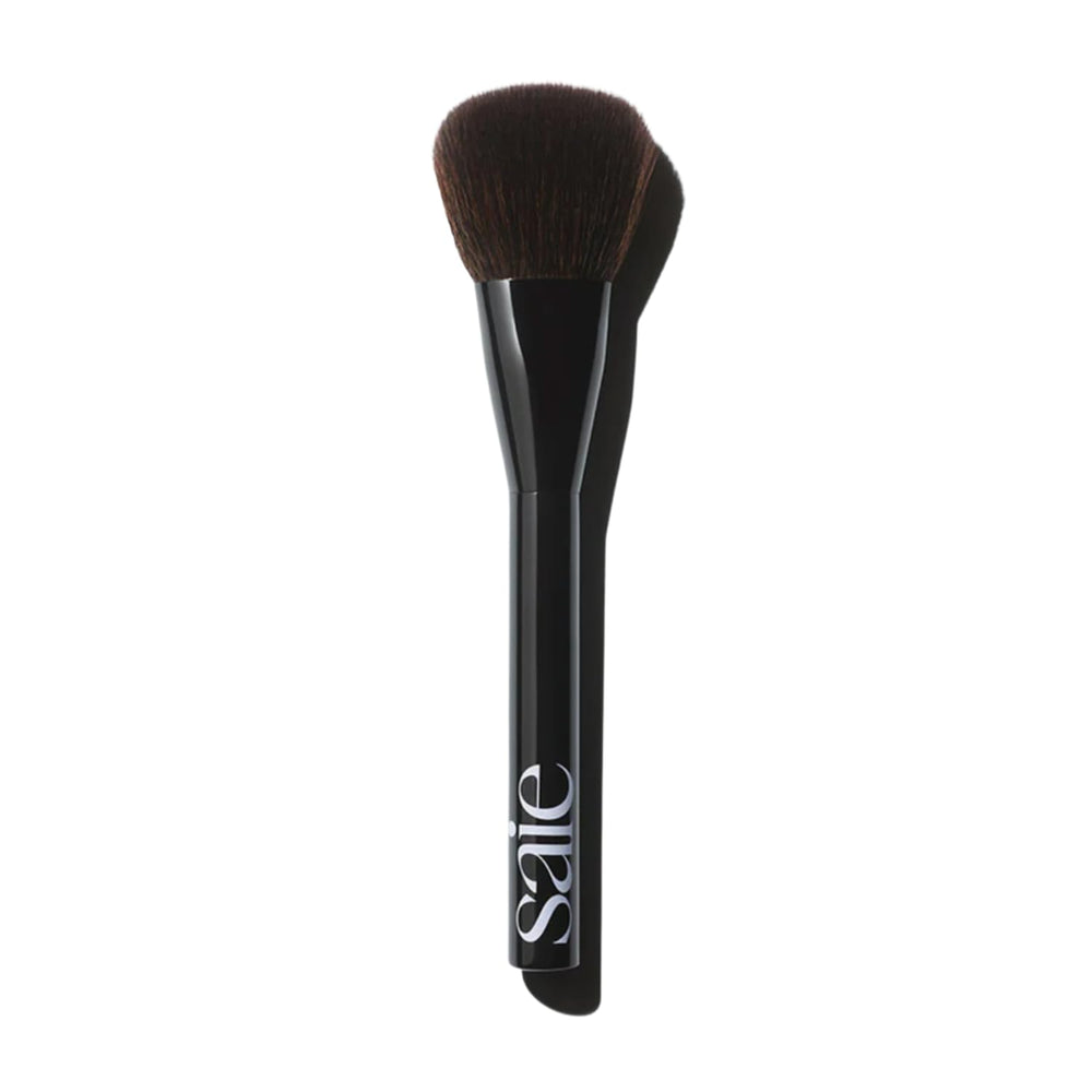 Saie Powder Blush Brush closeup shows ultra-soft bristles for precise, diffused color
