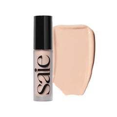 Saie Slip Tint concealer bottle close-up showing hydrating finish