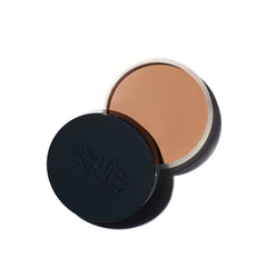 Saie Sun Melt Cream Bronzer packaging shows compact travel-friendly design for on-the-go color