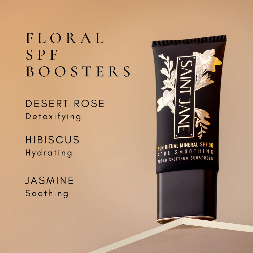 Gift-ready SAINT JANE box with floral motif highlights luxury sun care routine.