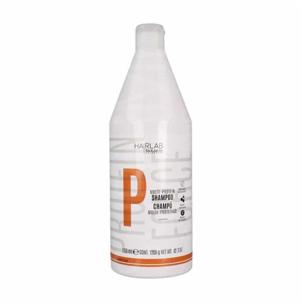 Salerm Hairlab Shampoo bottle pouring fortifying formula for damaged hair.