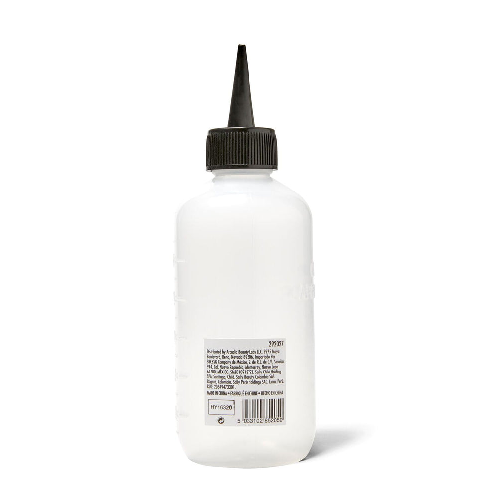Salon Care Narrow Tip Applicator Bottle demonstrates precise application for accurate color placement