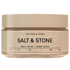 Salt & Stone body cream saffron-cedar jar closeup highlights rich hydration.