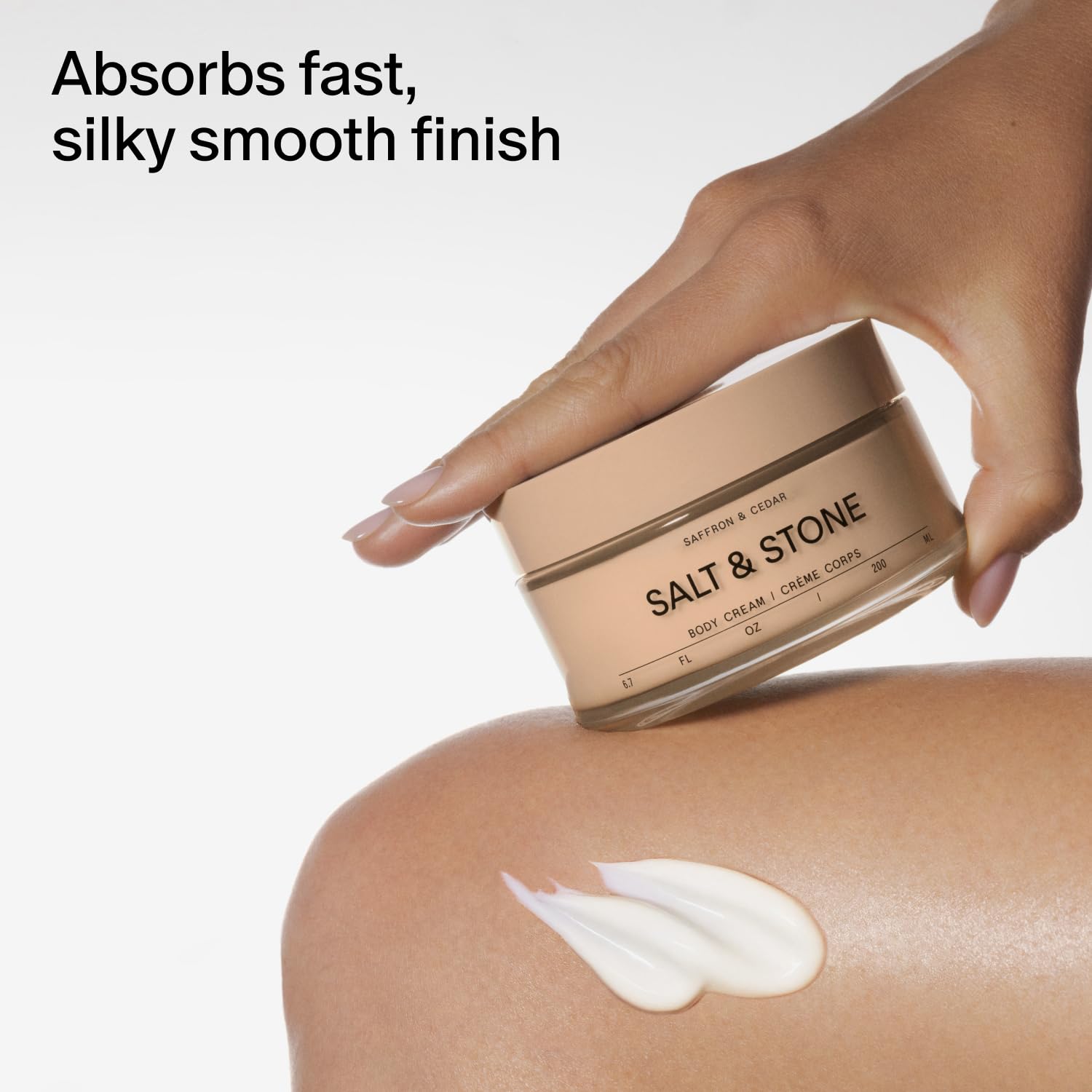 Salt & Stone body cream saffron-cedar unisex packaging emphasizes inclusive skincare.