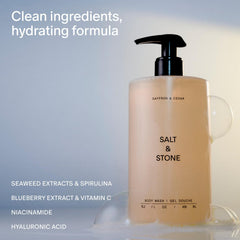 Salt & Stone body wash pour showing rich lather for plush cleanse.