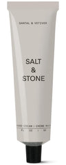 Salt & Stone hand cream bottle close-up emphasizing Santal & Vetiver hydration