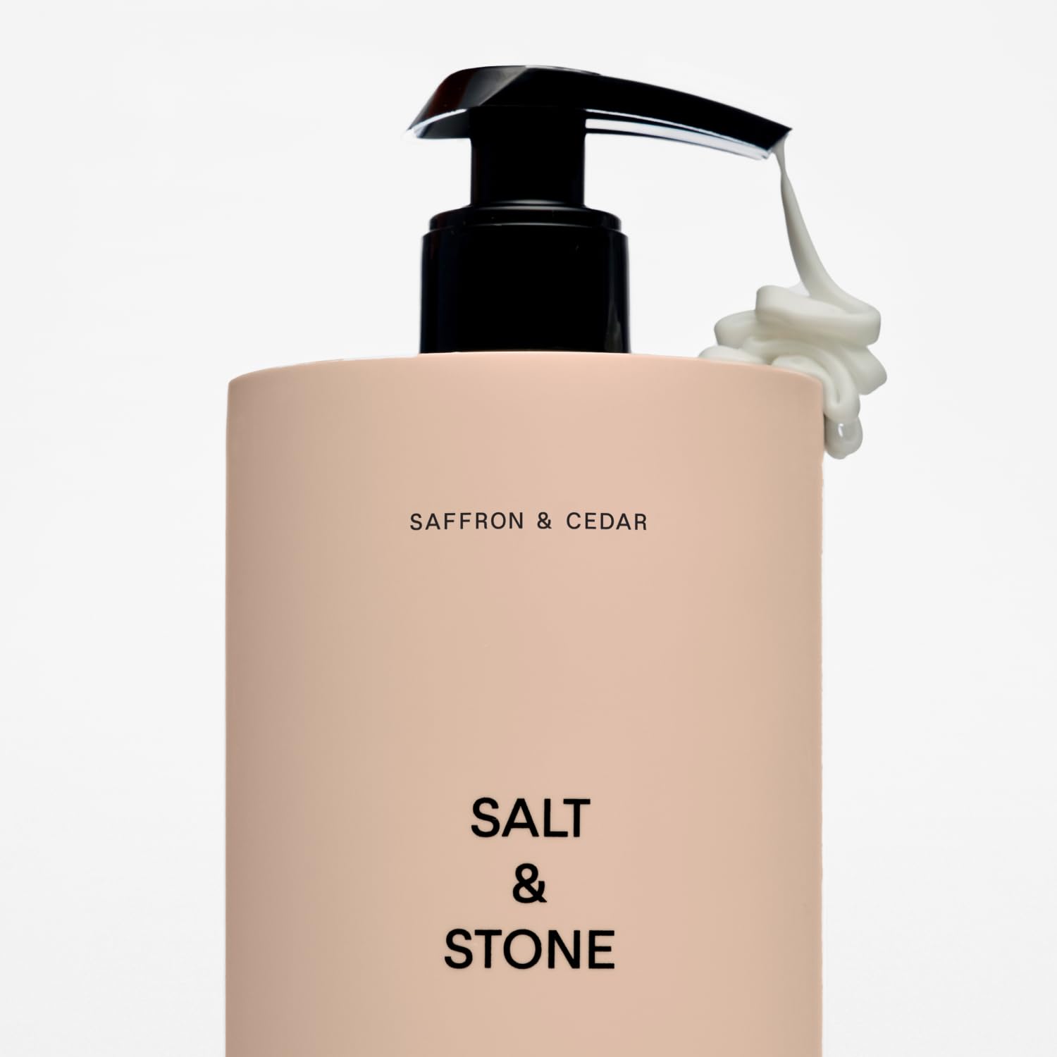 Salt & Stone saffron cedar fast-absorb demonstrates quick hydration after shower or gym.
