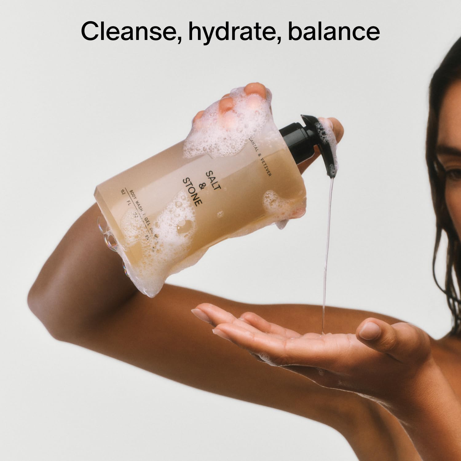 Salt & Stone Neroli Basil scent closeup, showcasing crisp green aroma for energizing showers.