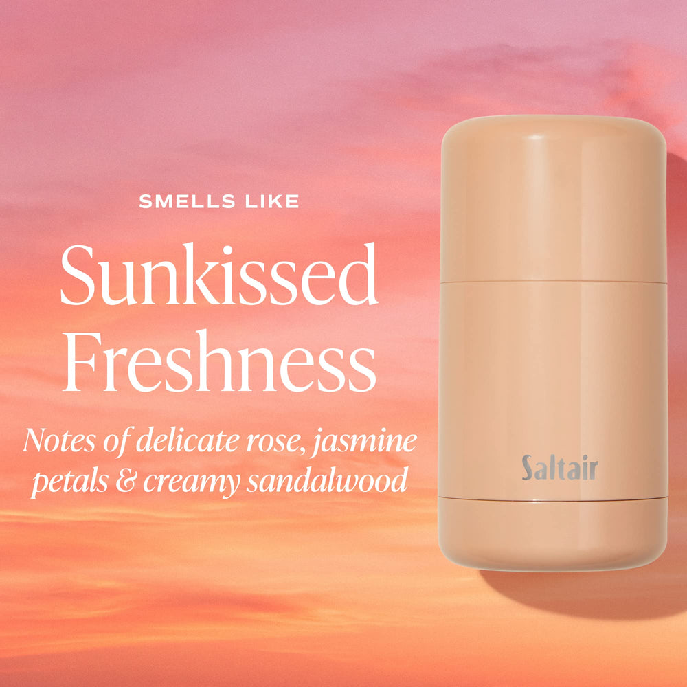 Santal Bloom bottle on wood with pear and lily-inspired scent notes.