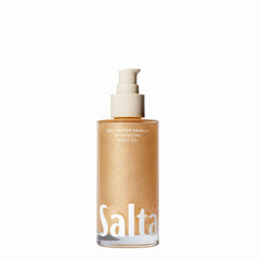 Saltair Shimmering Body Oil bottle pour shows sun-kissed glow for all skin types.