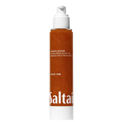 Saltair SPF Body Oil bottle-pump showing easy application and sun protection benefits.