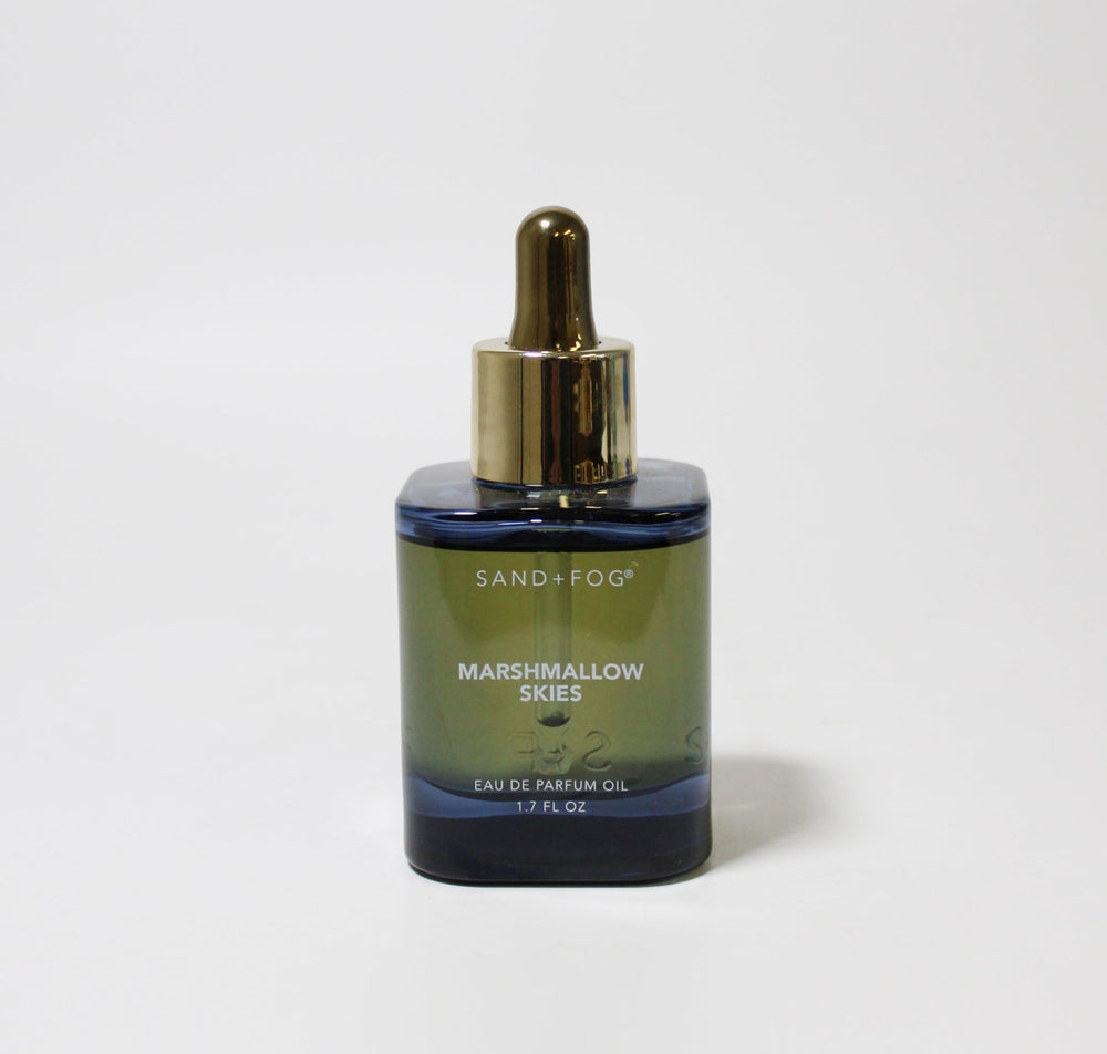 Sand + Fog Marshmallow Skies dark blue bottle highlights a concentrated parfum oil for intimate wear