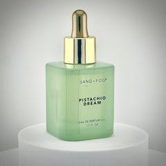 Sand + Fog Pistachio Dream dropper enabling precise, controlled fragrance application