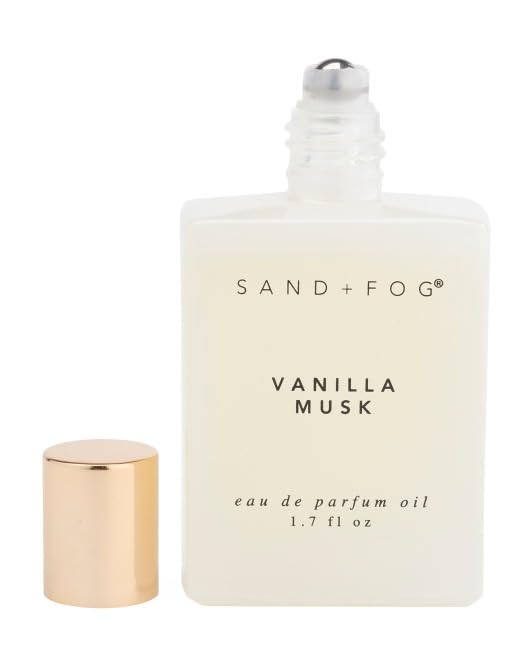 Sand + Fog Vanilla Musk rollerball applied to pulse point for intimate, long-lasting scent
