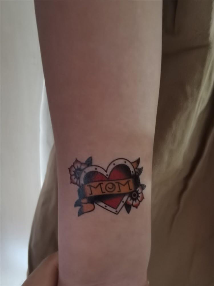 SanerLian Anchor Skull Swallow tattoo fades evenly while preserving shape
