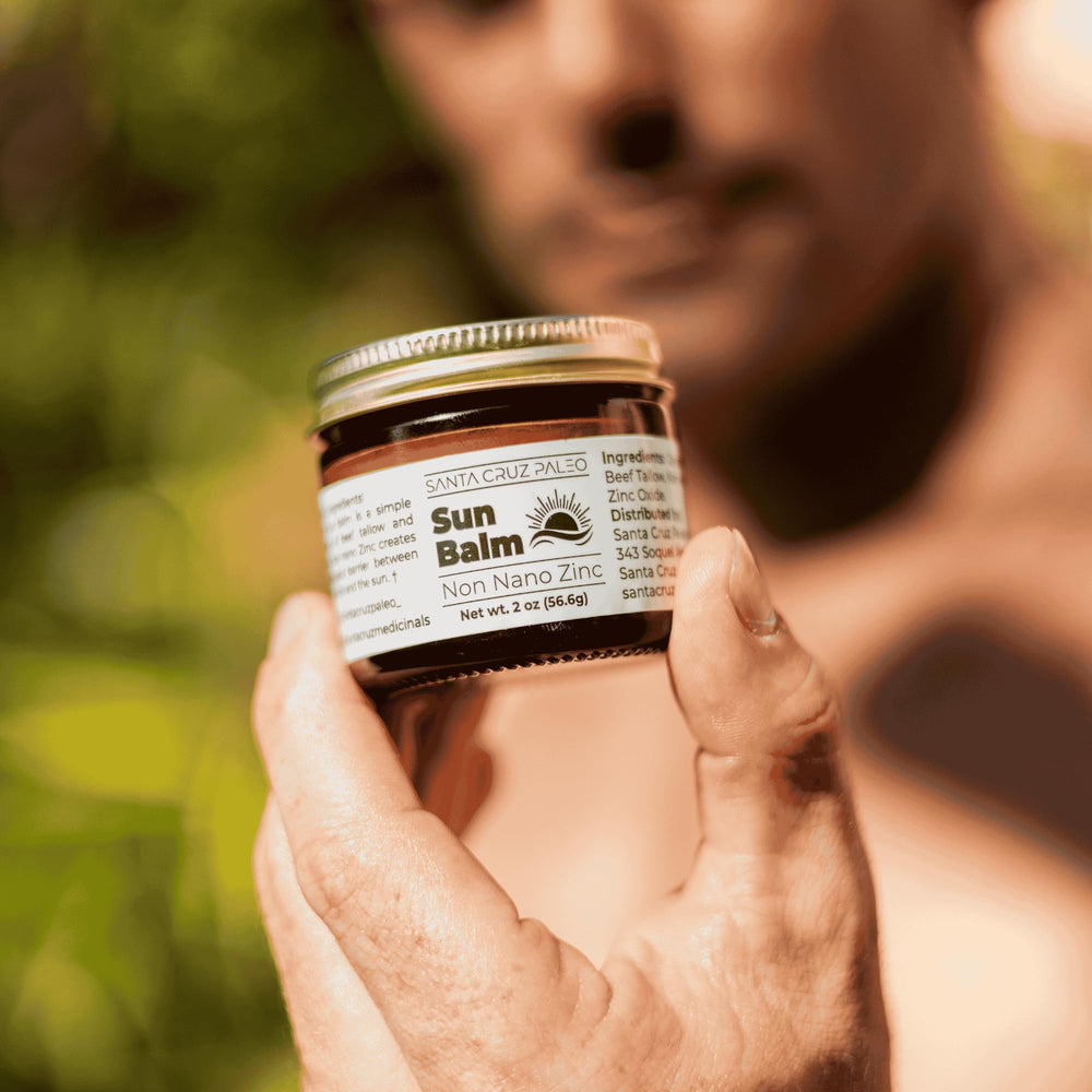 Santa Cruz Paleo outdoor balm in use during sunny hike