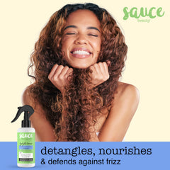 SAUCE BEAUTY detangler spray on curls detangles with lightweight nourishment.